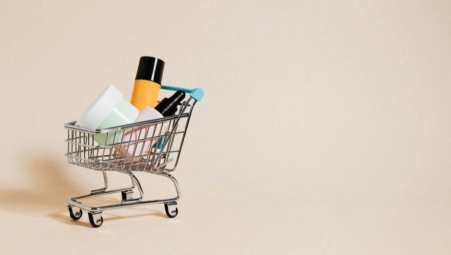 Cosmetics in a miniature shopping cart